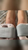 Noebra Calm strapped to the calf, then one on each leg in bed
